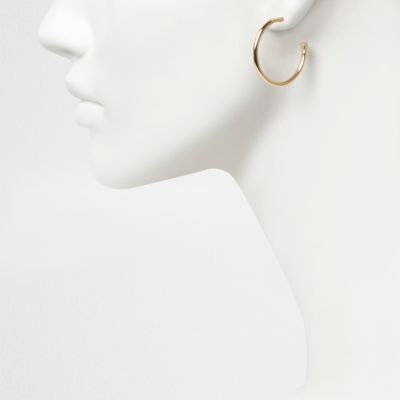 Gold tone cube back hoop earrings